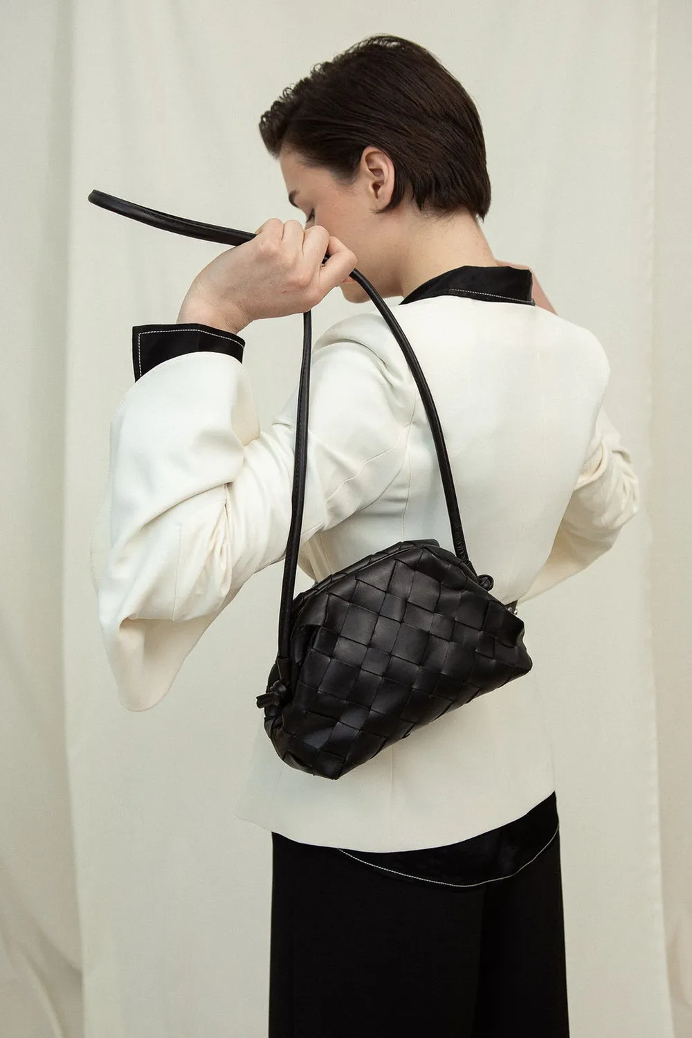 Cala Jade Aimee clutch svart flettet kuskinn