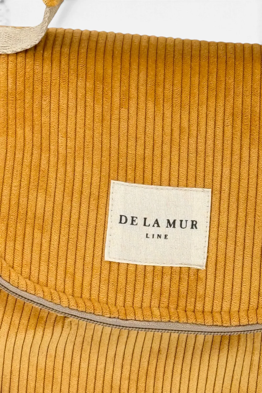 De La Mur Taz lunsjveske sennep isolert