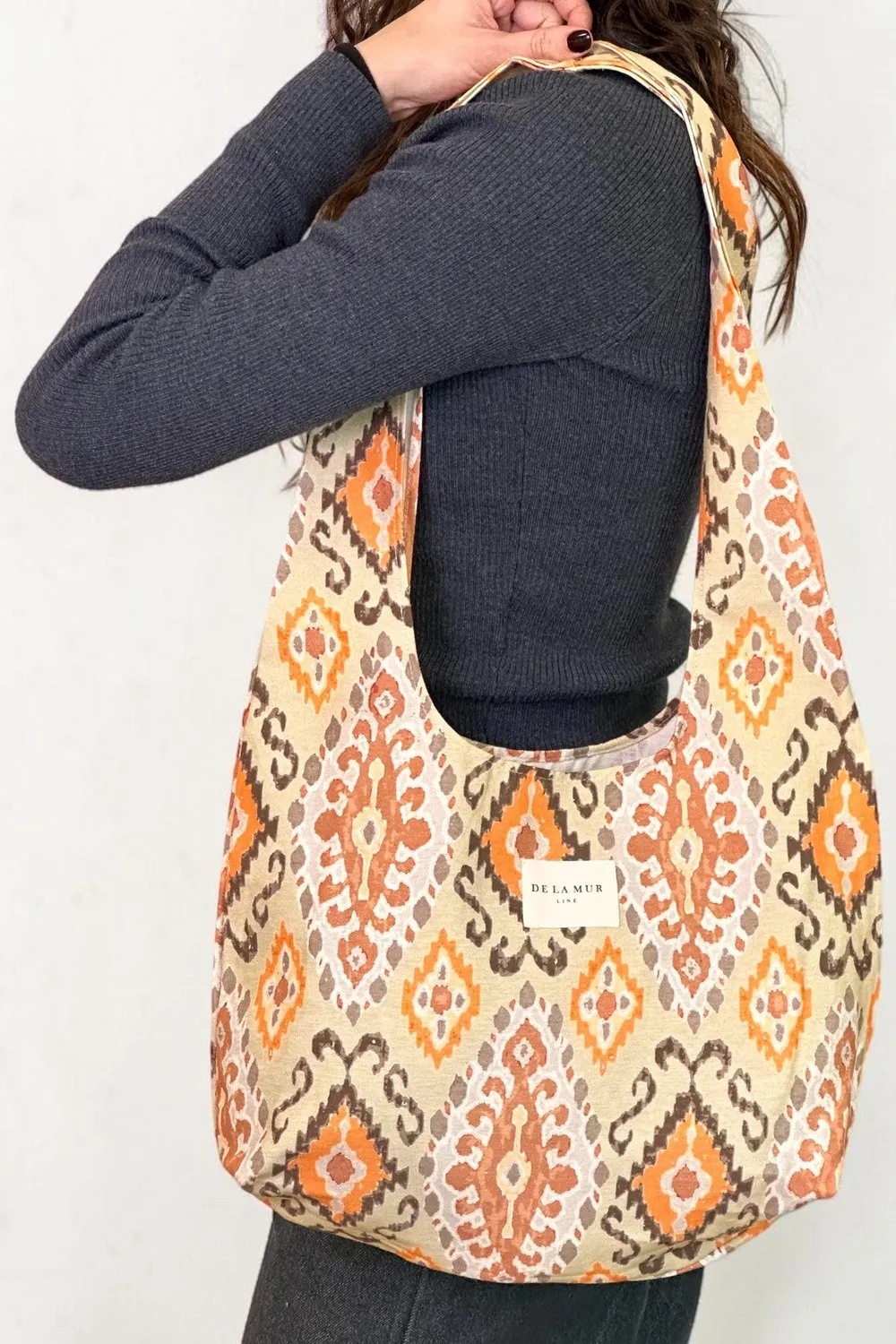 De La Mur Ikat Ovalada veske oransje 40 cm