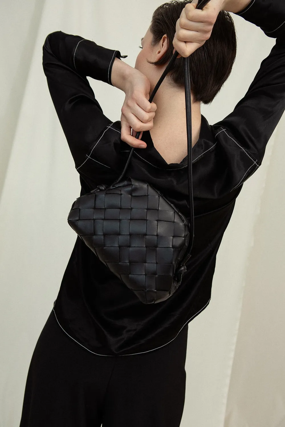 Cala Jade Aimee clutch svart flettet kuskinn