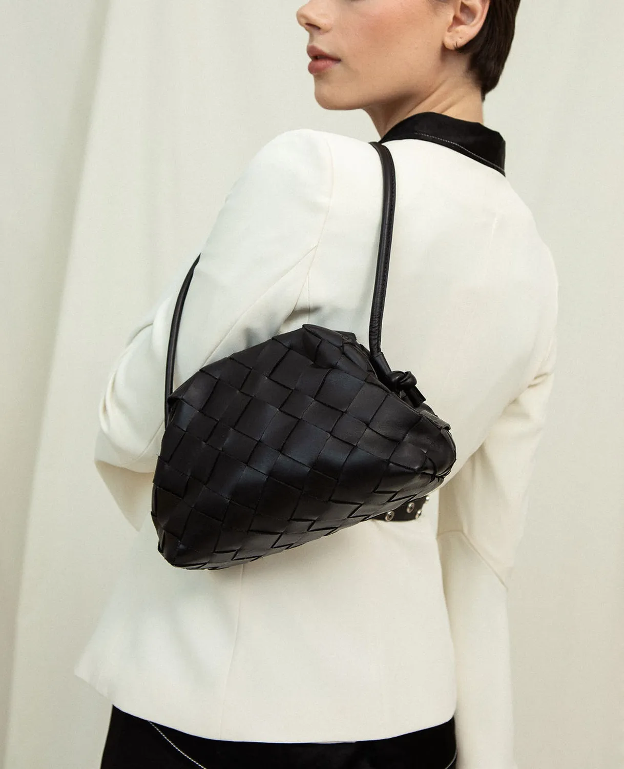 Cala Jade Aimee clutch svart flettet kuskinn