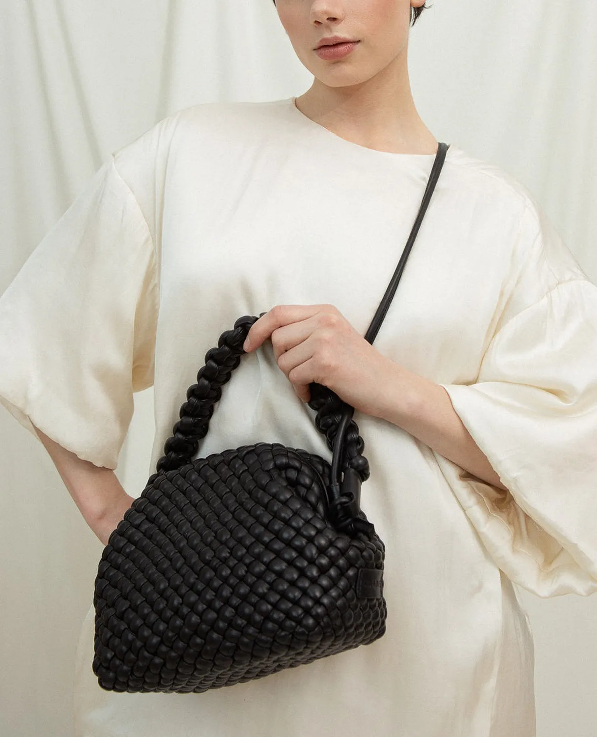 Calajade Hana clutch svart flettet kalveskinn